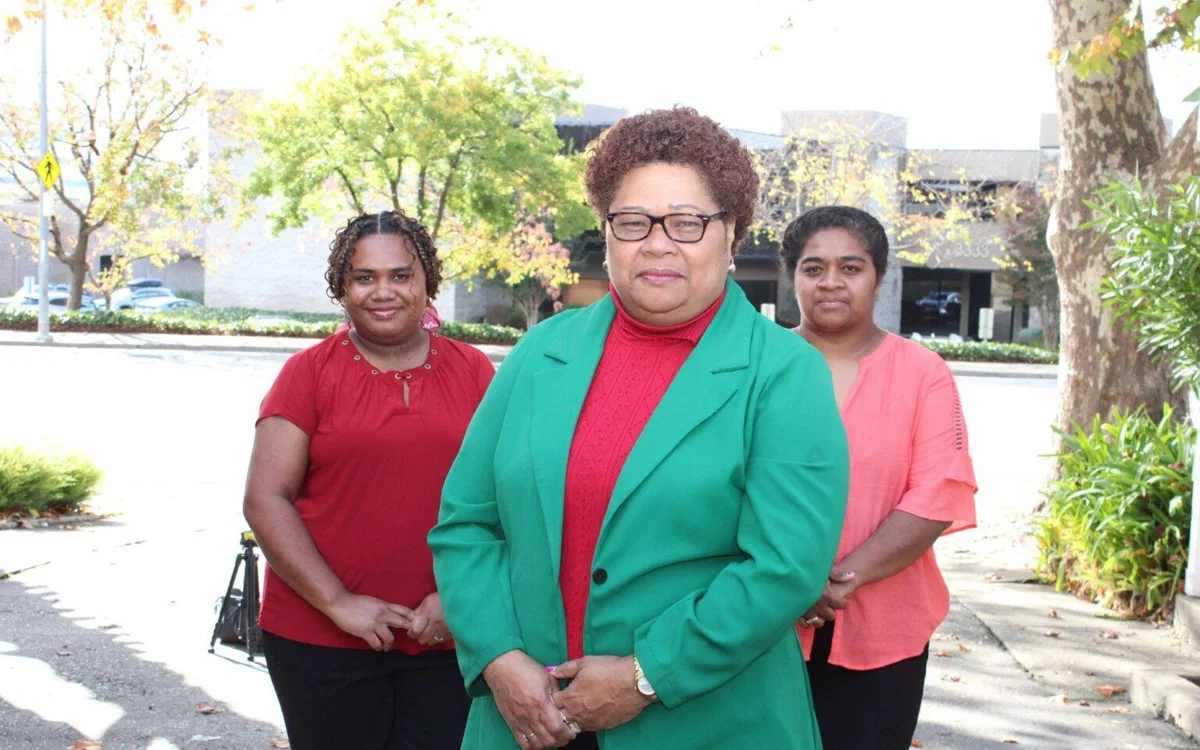 The Divine Fijians Supported Living Services leadership team outdoors