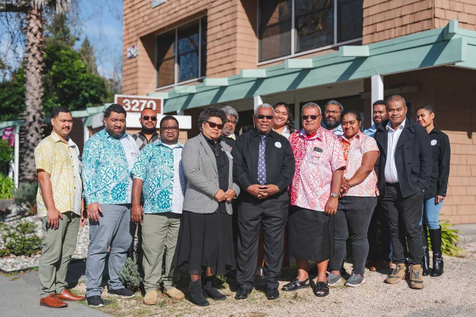 Group portrait outside the Divine Fijians office in Santa Rosa.